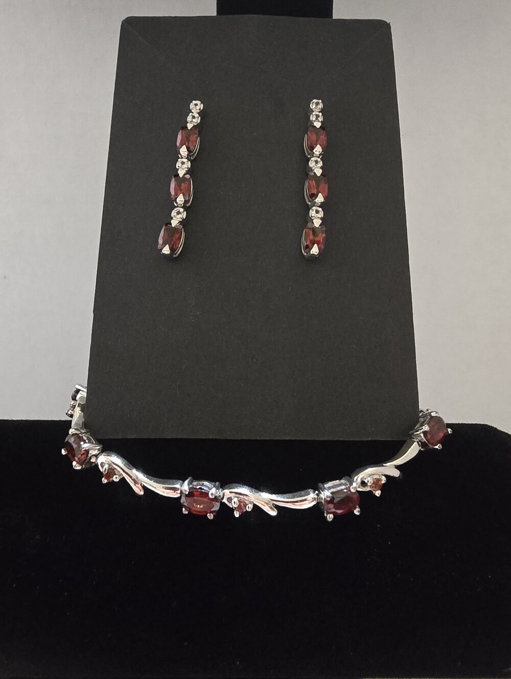Designer 'STS' 7.25 Inch Sterling Silver And Garnet Bracelet and Earrings Set